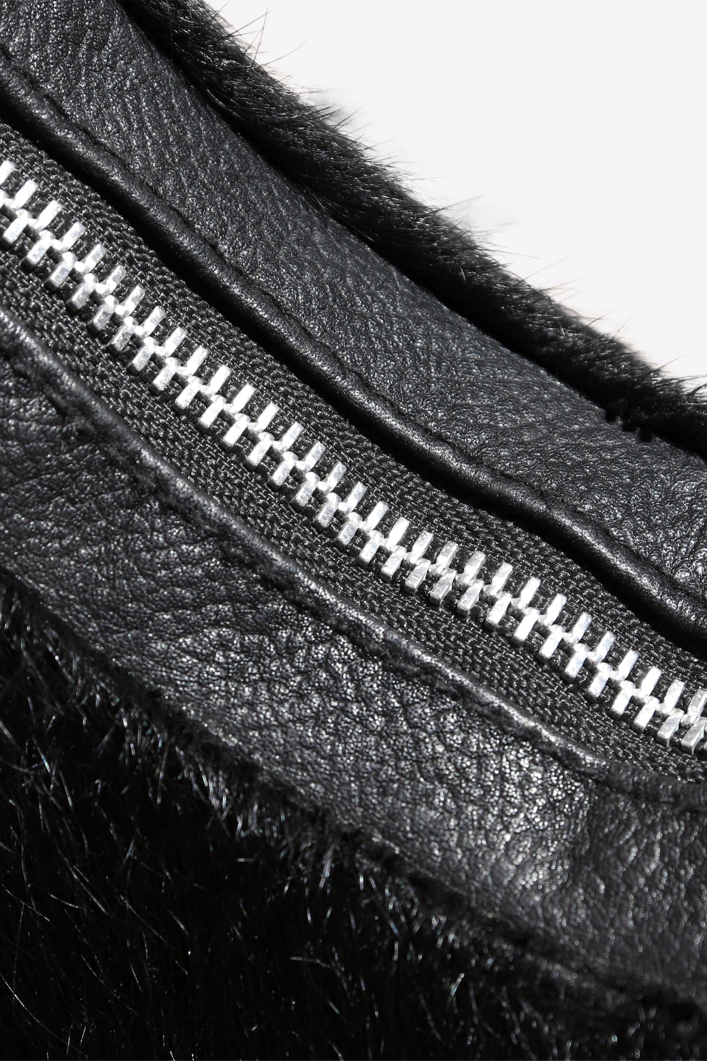 Bolso de media luna con pelo de poni